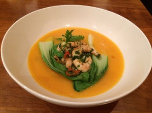 Pumpkin and coconut broth with spicy prawns