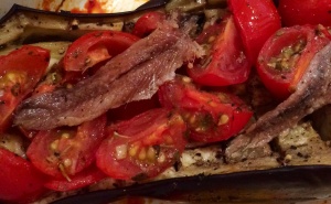 Baked aubergine with tomatoes and anchovies
